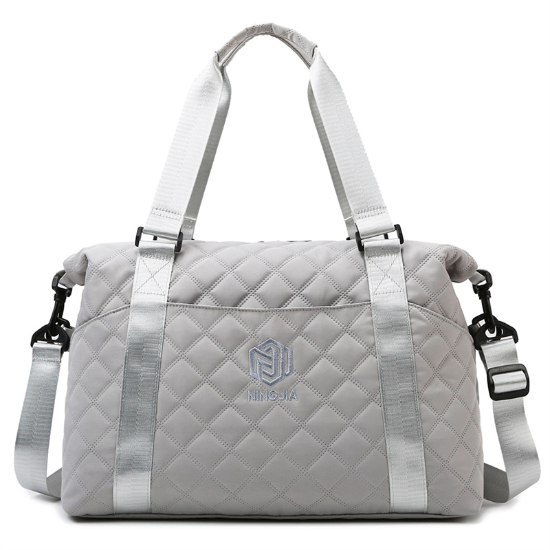 Bolsa de equipaje de viaje de rombo transfronterizo bolsa de fitness crossbody de estilo coreano ligero para mujer bolsa de almacenamiento de viaje de gran capacidad de alto grado