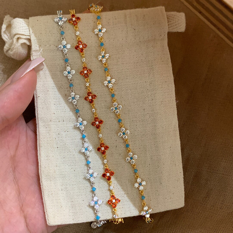 Sparkling Full Diamond Four-Leaf Clover Turquoise Bracelet for Women, Daily Wear, High-End Niche Exquisite Red Zircon Flower Jewelry