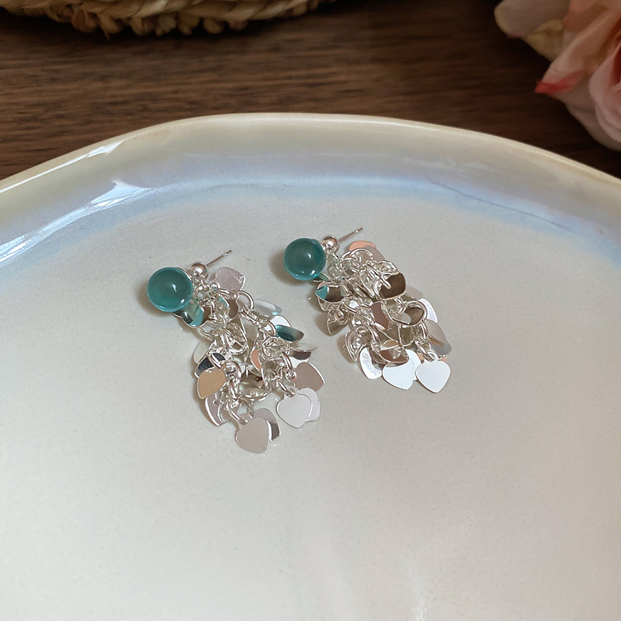 Aguja de plata-azul claro