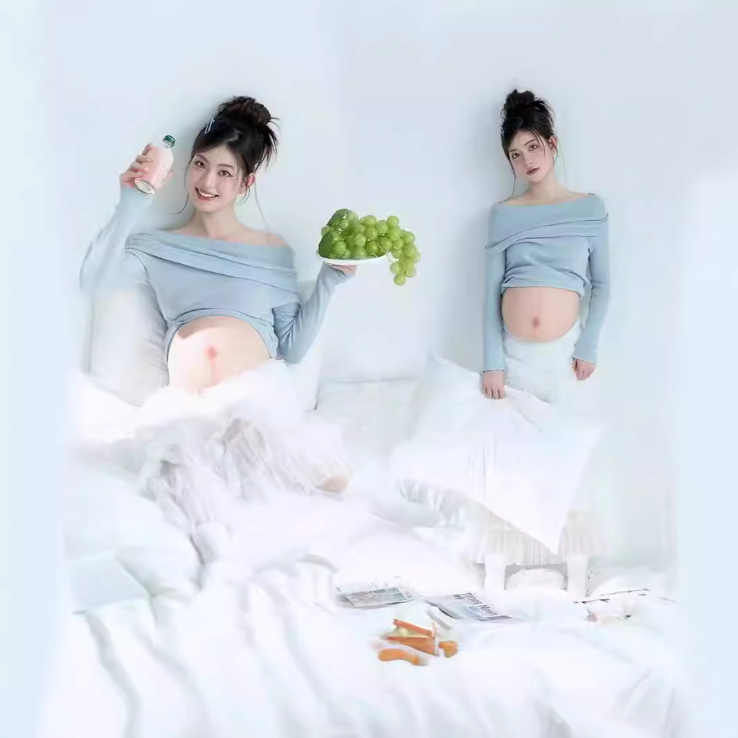 撮影のテーマの妊婦の新しい中国式の写真撮影の服装の妊娠するマミーの大きい腹は水墨画の風格を照らして長いスカートを撮影します。