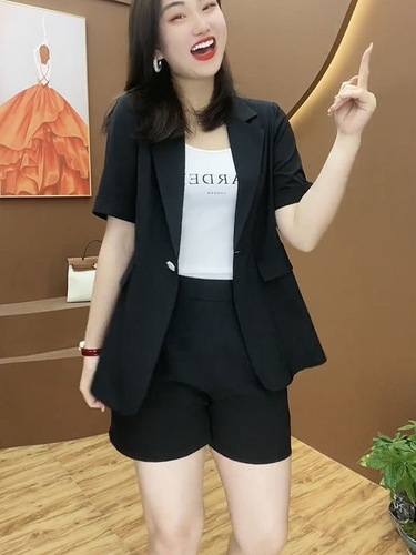 Plus-size women's casual shorts and suit set for summer—timeless, trendy, and stylish two-piece outfit designed to flatter curves.