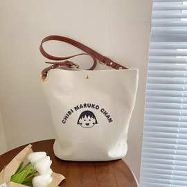 南风联名款梦想家水桶包包上班族单肩斜挎帆布包笑脸小众女包百搭