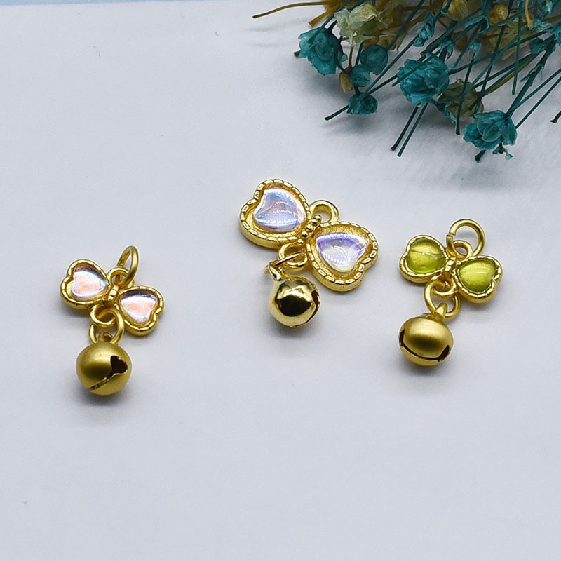 Ancient gold inlaid cat's eye Aurora color pendant small drop pendant 14k bag gold bow bell bracelet hanging Ancient gold inlaid cat's eye Aurora color pendant small drop pendant 14k bag gold bow bell bracelet hanging