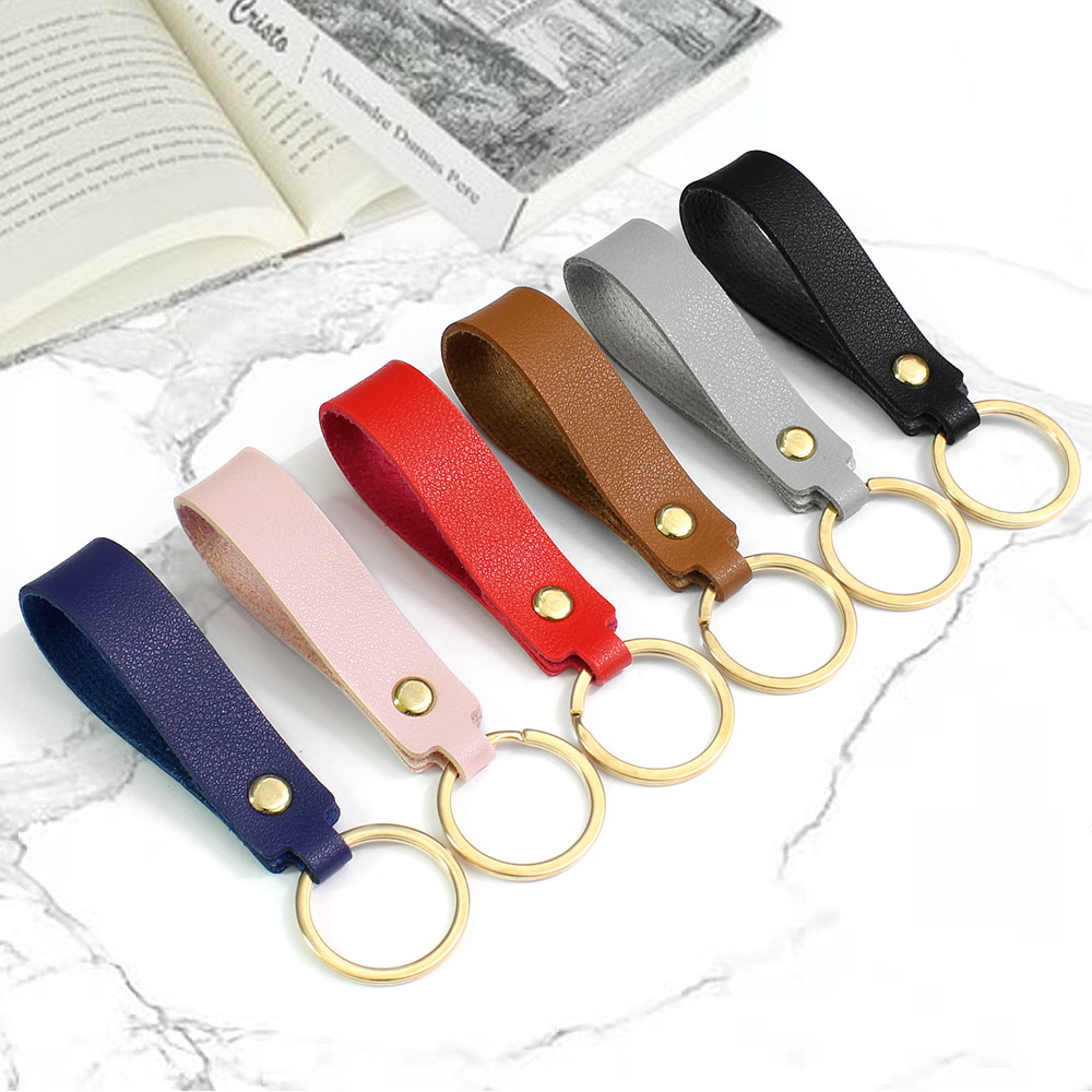 PU llavero universal de los hombres y mujeres de cuero hechos a mano del coche llavero anillo accesorios colgante se puede personalizar logo