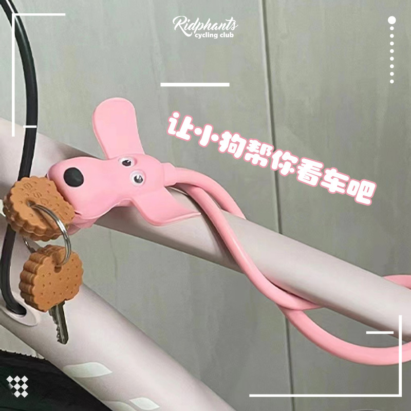 赤い本の同じタイプのシリコンの漫画のビスケットの子犬の自転車の創意の車は安全ロックの盗難防止の鍵をロックします。