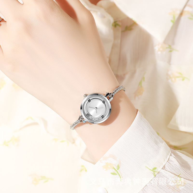Pulsera literal de diamantes rotos de sensación de nicho de alta gama, reloj, cinturón pequeño, nuevo reloj de mujer de cuarzo de arena movediza de celebridades de Internet al por mayor