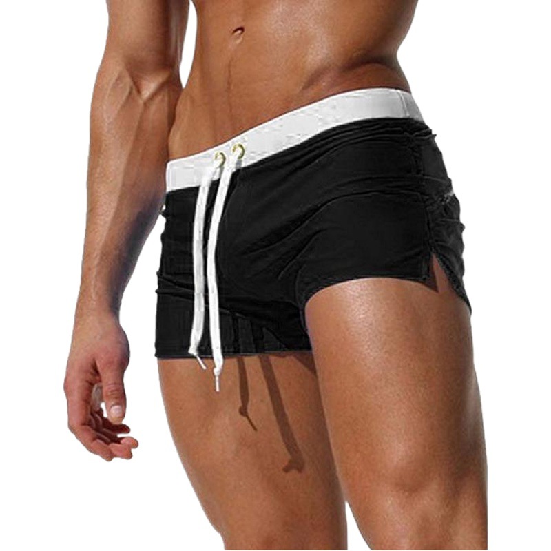 European and American men's solid color sexy fashion back pocket design beach breathable quick-drying pants flat angle beach pants swimming pants