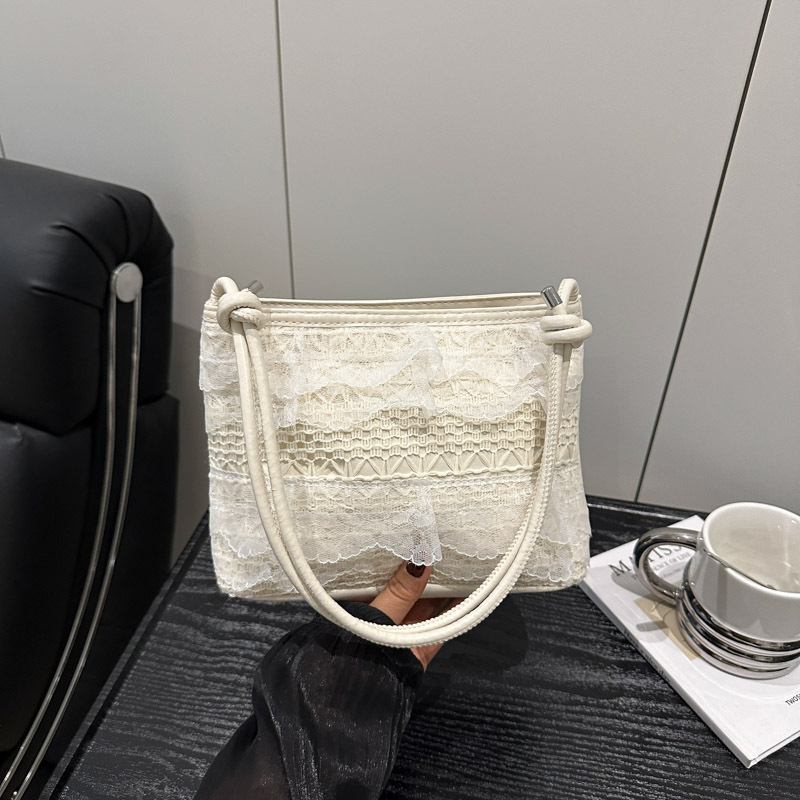 Bolso de mujer 2025 nuevo estilo casual dulce moda coreana estilo occidental textura salvaje bolso de cubo de un solo hombro mujer de alto valor