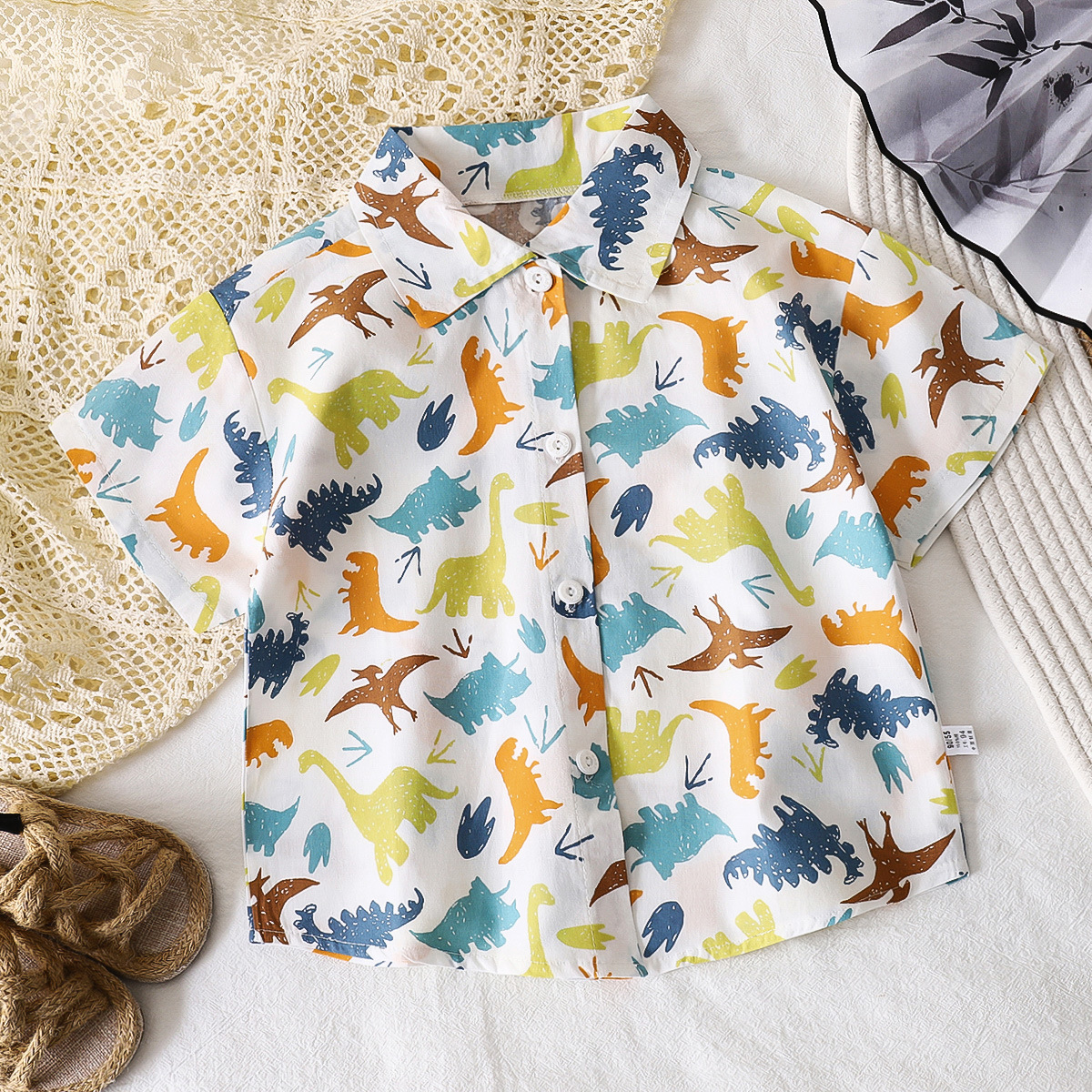 Camisas para niños verano nuevo estilo rebeca de manga corta para niños chaqueta de algodón para bebés camisa de solapa ropa para niños al por mayor