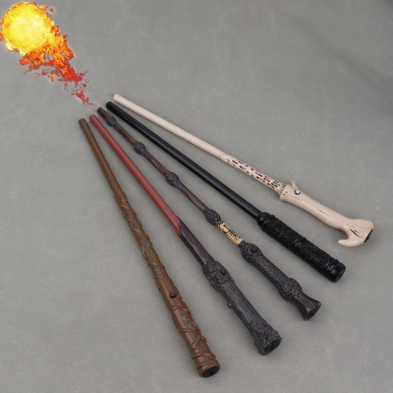 El fabricante vende directamente la varita de Harry Potter para rociar la varita de fuego, la varita mágica de dumbledore, el juguete de cumpleaños para rociar la varita de fuego.