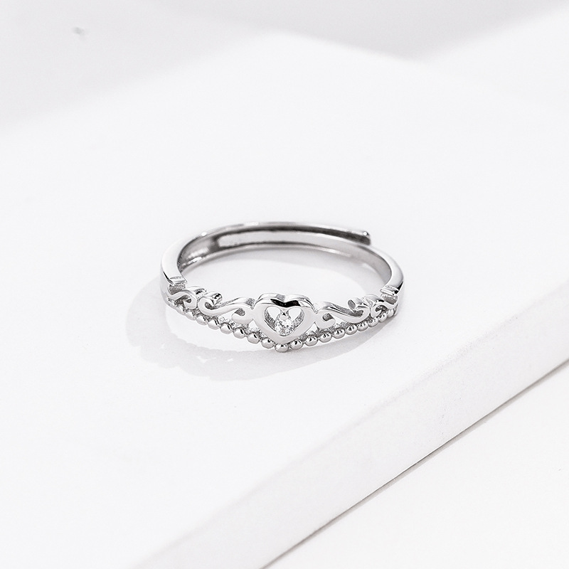 Anillo de pareja de corona pequeña un par de S925 plata esterlina temperamento simple pareja hombres y mujeres anillo boca abierta diseño de nicho