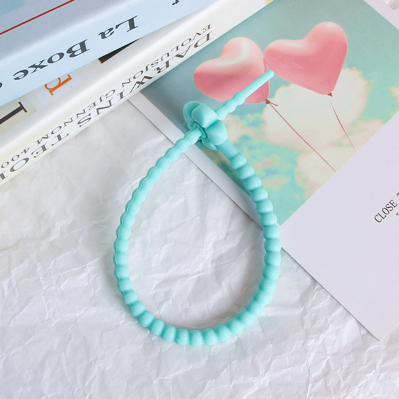 25cm colorido pequeña flor de silicona cuerda DIY joyería llavero accesorios auto-bloqueo cordón Correa cordón corbata