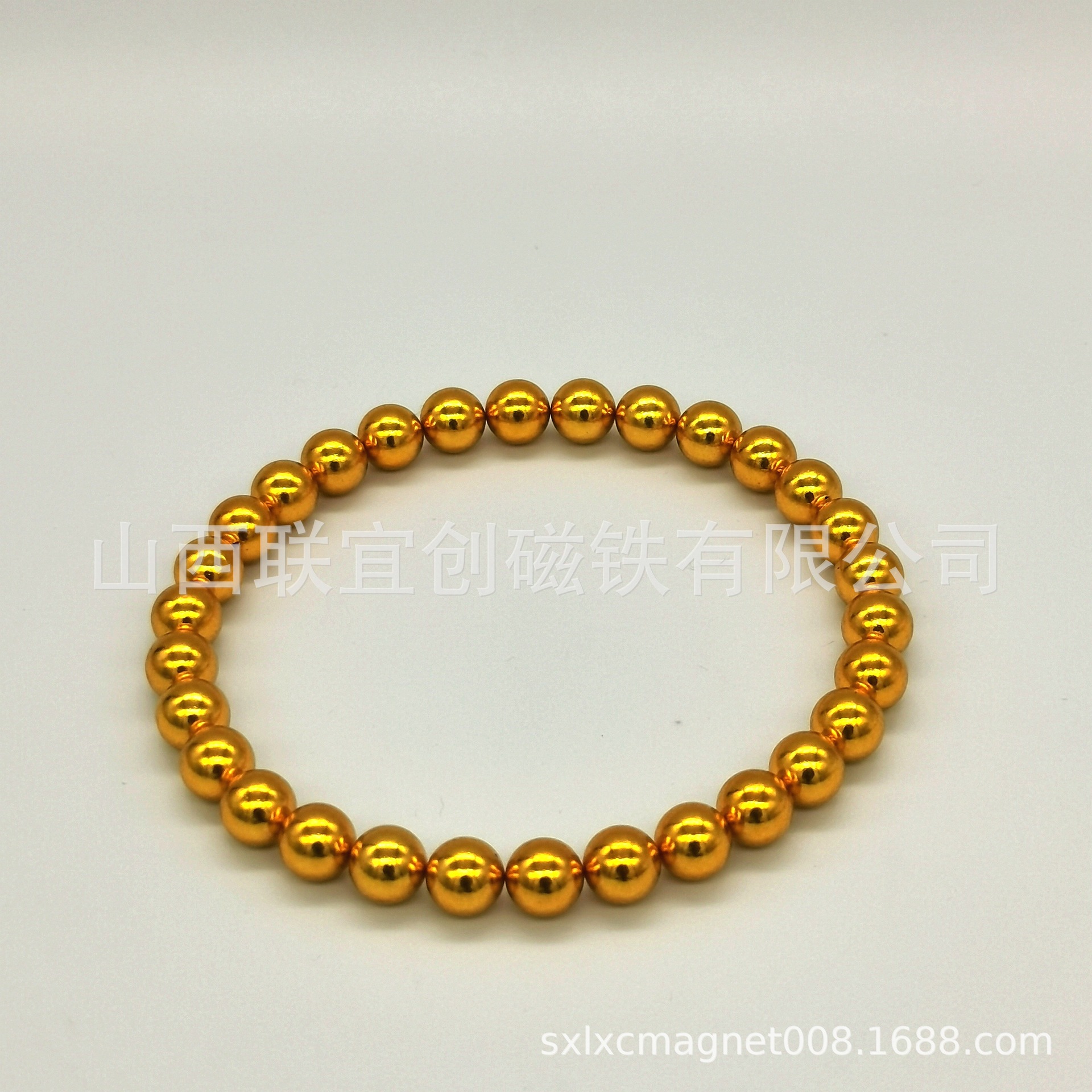厂家直销 7mm金色磁灸石稀土无绳自吸项链 磁能珠手链 磁疗石项链