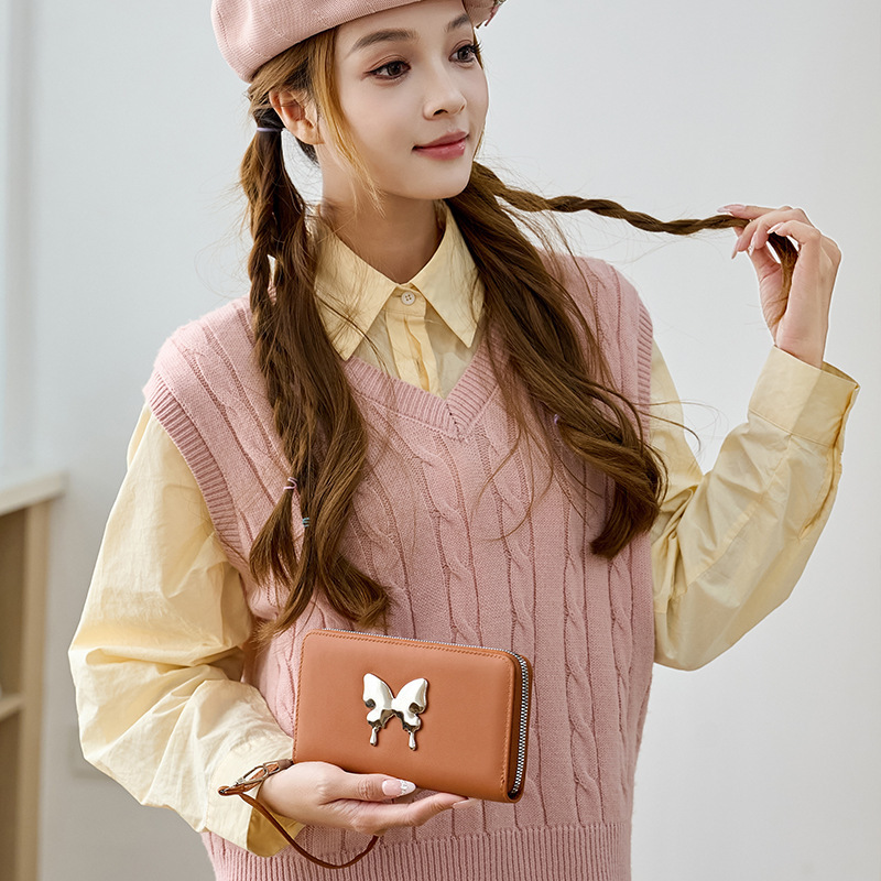Nicho coreano 2024 mariposa metálica decoración PU material compacto exquisito lindo bolso de mano de mujer