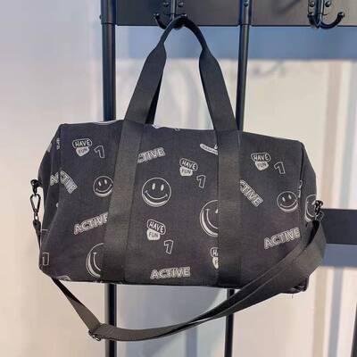 men and women leisure time Bag Korean Edition Denim bag capacity Travelling bag fashion Smiling face letter printing One shoulder Inclined shoulder bag