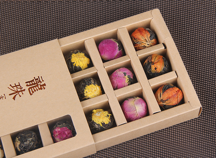 Yunnan Raw Pu-erh Flower Tea Dragon Balls Gift Box Six Floral Flavors 144g in use