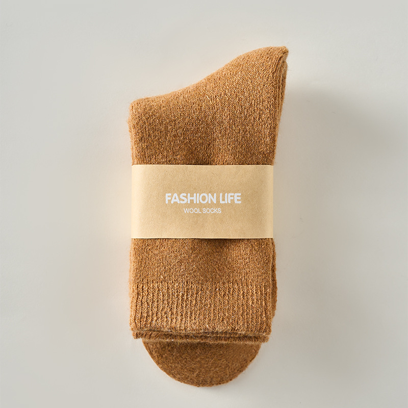 Calcetines de lana otoño e invierno más calcetines de mujer engrosados de terciopelo para hombres Calcetines cálidos de felpa de color sólido Calcetines de tubo medio para mujer de nieve