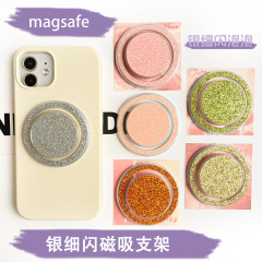 マグネット式エアバッグスタンド吸盤式携帯電話スタンド手に適用します。