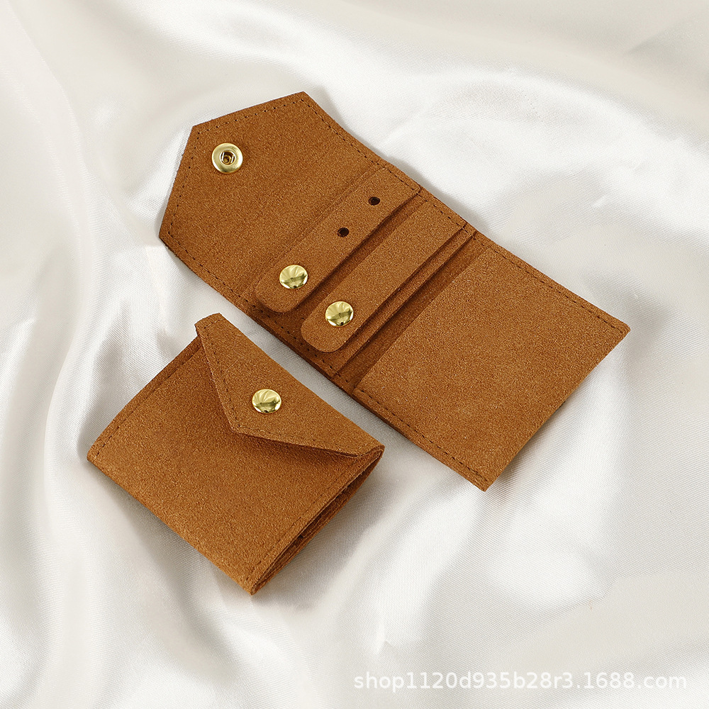 Spot microfibra portátil multifuncional mini joyería rollo de joyería pendiente anillo pendiente collar bolsa de protección de almacenamiento