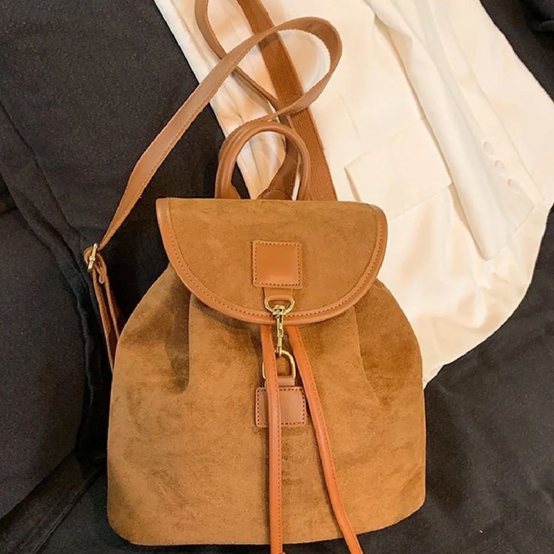 Mochila de suministro del fabricante 2025, bolso nuevo para mujer, moda informal, simple, de cuero de alta gama, para estudiantes