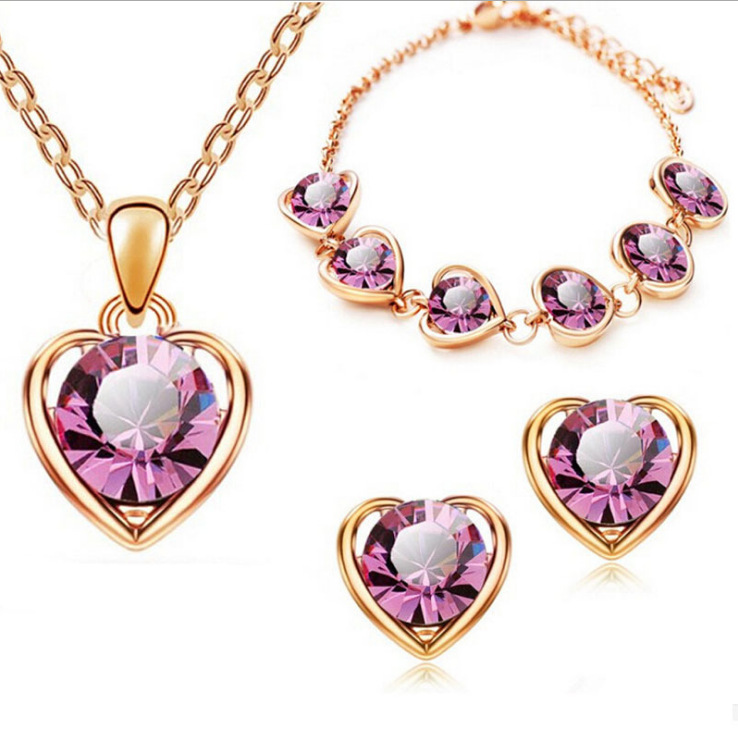 Directo de fábrica al por mayor en stock moda cristal Corazón en forma de corazón collar pendientes anillo pulsera conjunto de cuatro piezas