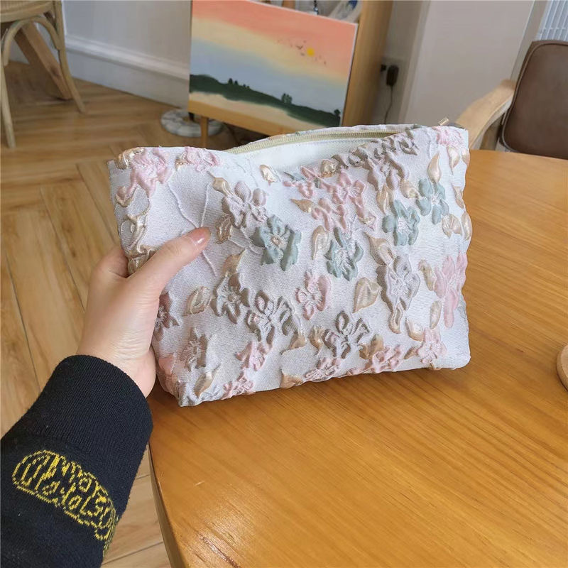 Bolsa de cosméticos de gran capacidad portátil fresco pequeño floral ins bolsa de almacenamiento bolsa de lavado elegante bolsa de almacenamiento jacquard