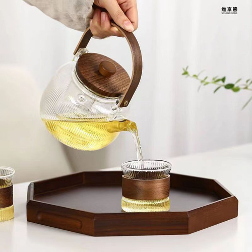 High temperature resistant flower teapot set fruit boiling teapot household steaming integrated wooden handle glass vertical pattern teapot