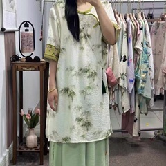 綿麻の新しい中国式のゆったりした夏の国風の上着の袖口の刺繍は腹の民族の風のワンピースの女性の薄いタイプの長いシャツを覆います。