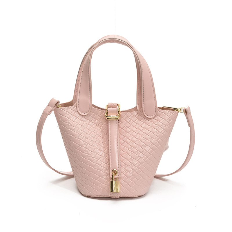 Bolso de cubo portátil con patrón tejido para mujer 2025 nuevo estilo coreano de lujo ligero de alta gama bolso de mensajero para niños de nicho