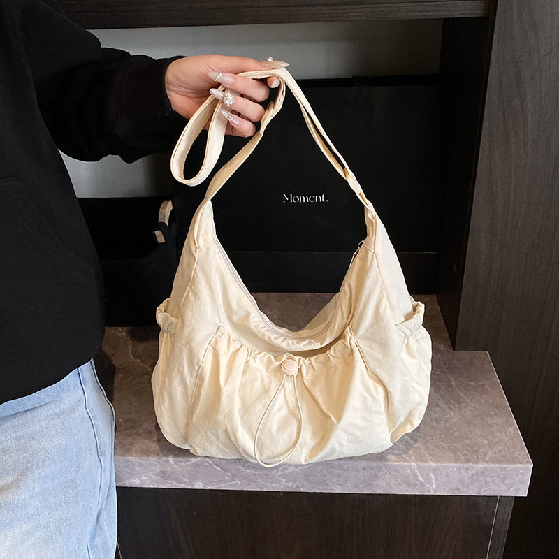 Korean Style Fashionable Nylon Drawstring Shoulder Bag 2025 New Arrival Large Capacity Student Crossbody Bag Lightweight Commuter Backpack for Women Korean Style Fashionable Nylon Drawstring Shoulder Bag 2025 New Arrival Large Capacity Student Crossbody Bag Lightweight Commuter Backpack for Women