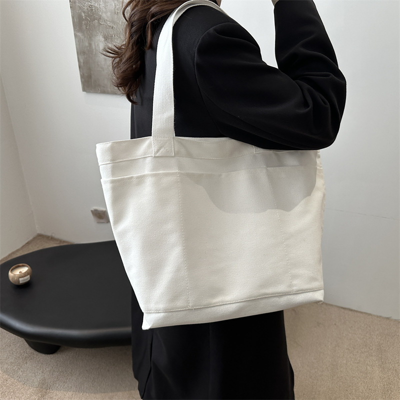 Invierno nuevo paquete de gran capacidad 2024, popular este año bolsas ociosas coreanas, bolsas de hombro de lecciones de reparación