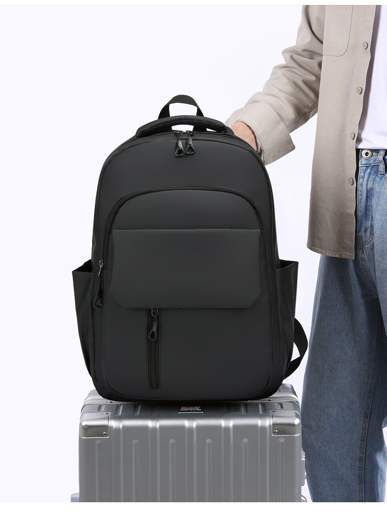 Wholesale of in-stock commuting and business backpacks for men, simple and large-capacity USB charging laptop bags, and student schoolbags undefined