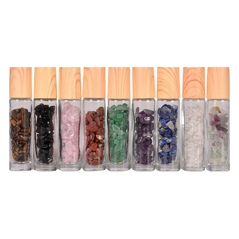 Venta caliente de fábrica en stock 10ml cubierta de grano de madera botella de cuentas de aceite esencial perfume sub-botella de cristal de grava Jade botella de bolas de rodillo