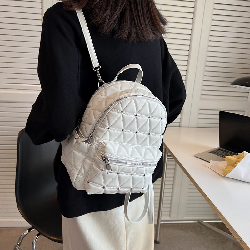 Capacious backpack with diamond pattern