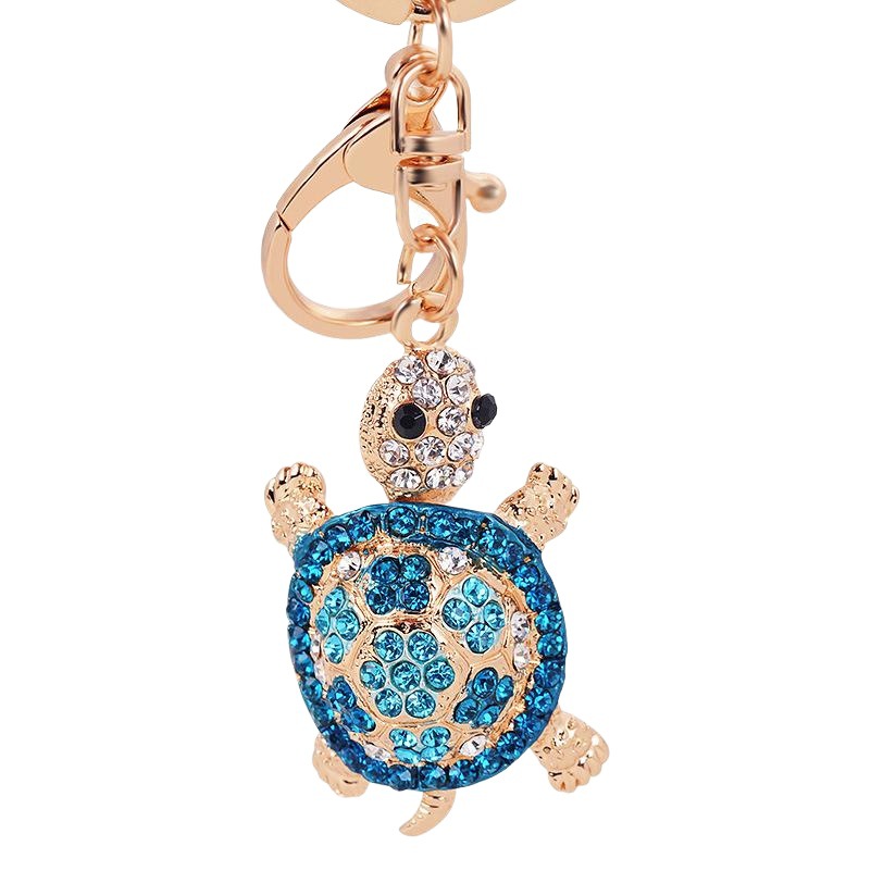 新型の越境創意カメはドリルの合金の鍵を入れて女子学生のファッションのカバンを掛けて飾ります自動車のペンダントの卸売りを飾ります。