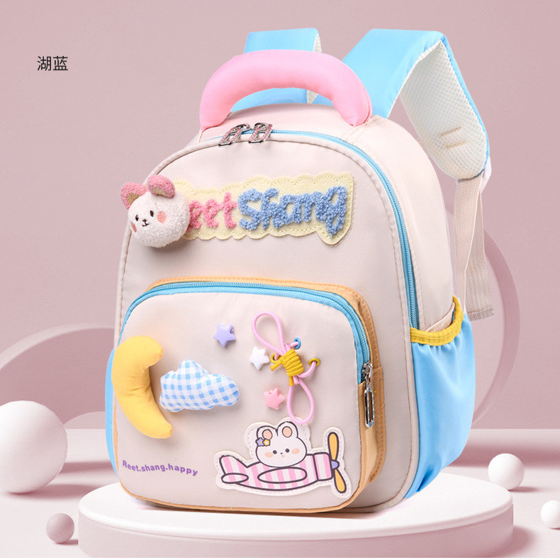 Nueva mochila de jardín de infantes para niñas en el jardín de clases pequeñas, clases medianas, clases grandes, dibujos animados ligeros y suaves, mochila para niños para hombres