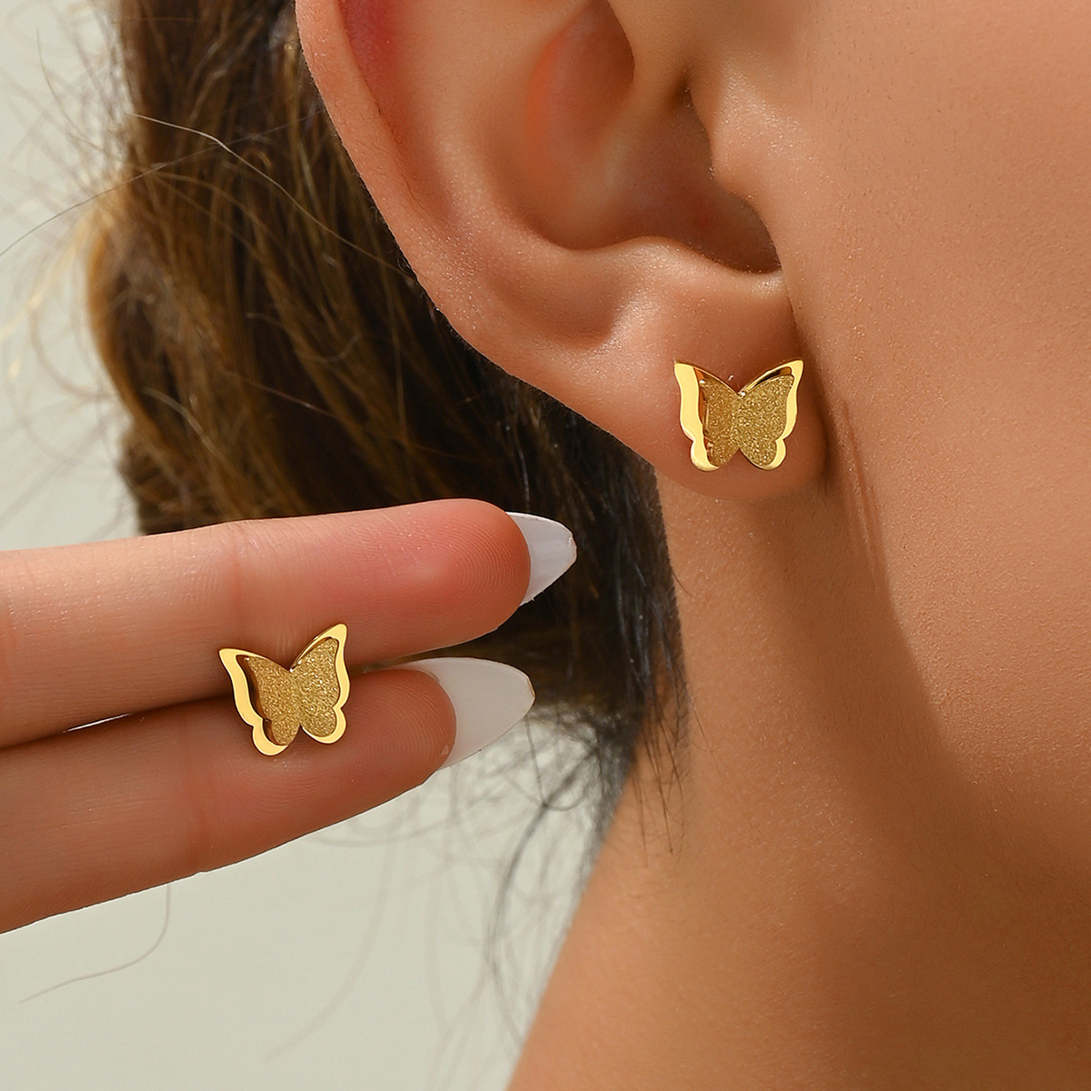 Sophisticated fashionable trend elegant matte golden earrings…