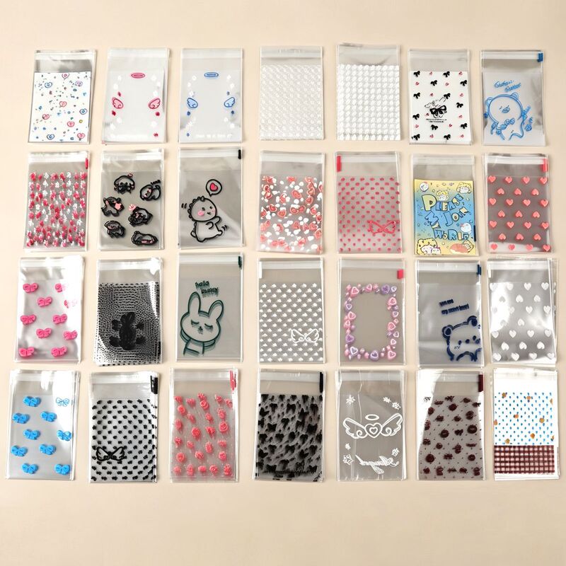 New large collection of 8cm wide self-adhesive bags for jewelry storage, cartoon print self-sealing bags, ins plastic self-adhesive bags wholesale New large collection of 8cm wide self-adhesive bags for jewelry storage, cartoon print self-sealing bags, ins plastic self-adhesive bags wholesale