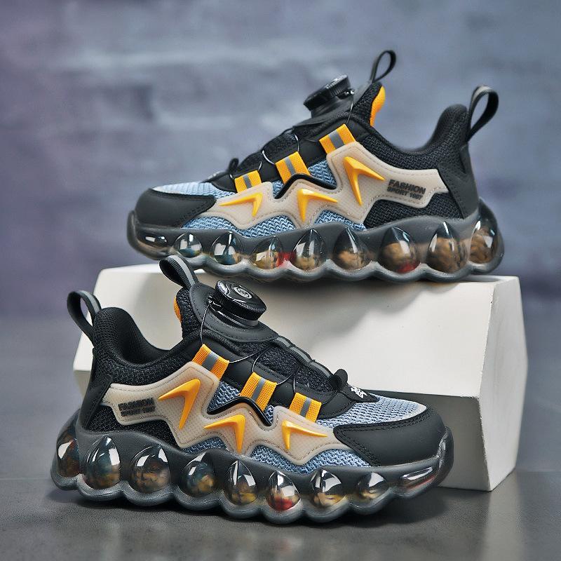 Chaussures de sport printemps/été pour garçons, nouveau modèle, en maille respirante avec bouton rotatif, design tendance pour l'été_voghion.com