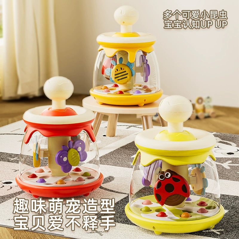 Трансграничный новый ребенок 0-3 года нажимает на вращающийся мяч