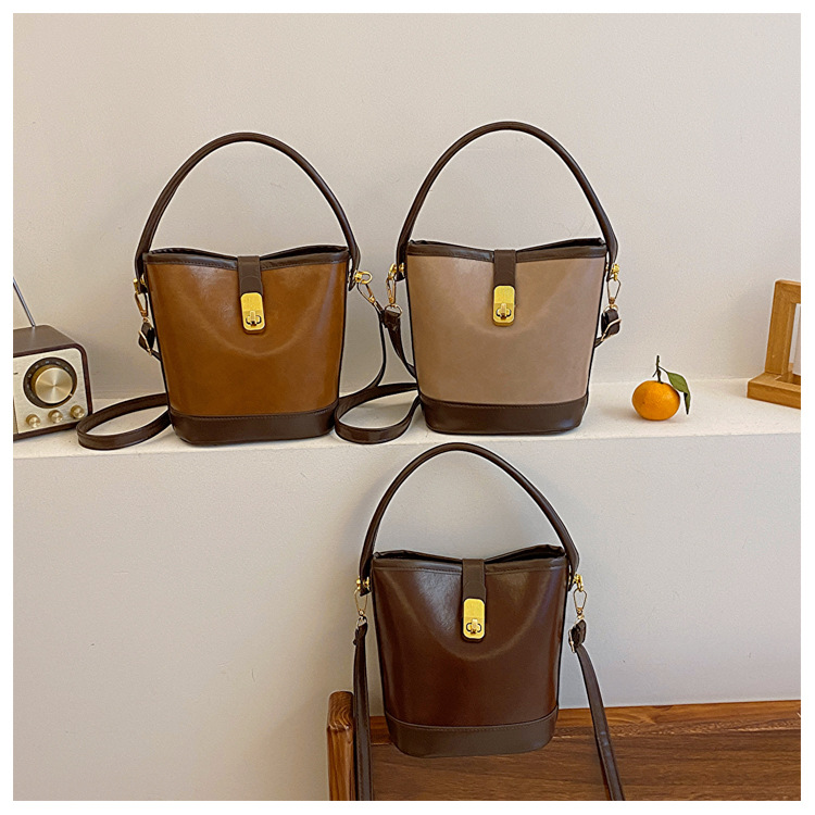2024 New Women's Bag High End and Fashionable Handheld Bag Women's Retro and Simple Water Bucket Bag Small Cross Body Shoulder Bag_voghion.com