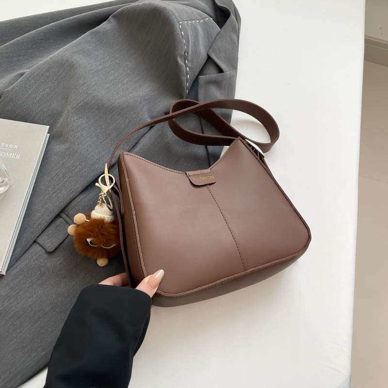 2025 primavera nueva moda bolsos de mano de hombro de gran capacidad bolsos tote bolsos de mujer bolsos de viaje bolsos versátiles para mujeres