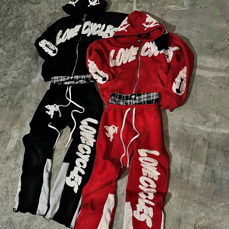 Two-piece sports suit with appliqué and distressed embroidery, consisting of double-layer sports pants and a zip-up hoodie Two-piece sports suit with appliqué and distressed embroidery, consisting of double-layer sports pants and a zip-up hoodie