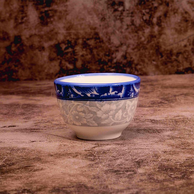 Comercio electrónico al por mayor de impresión verde cuencos y platos de cerámica se adaptan a las necesidades diarias vajilla de porcelana azul y blanca dos yuanes más que el suministro de la tienda