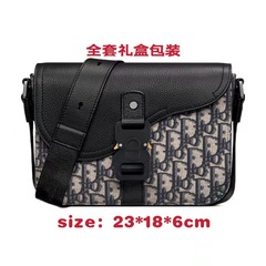 春夏の新型男性用サドルバッグ牛革郵便差キャンバスカバー欧米ファッションビジネスシングルショルダーバッグ