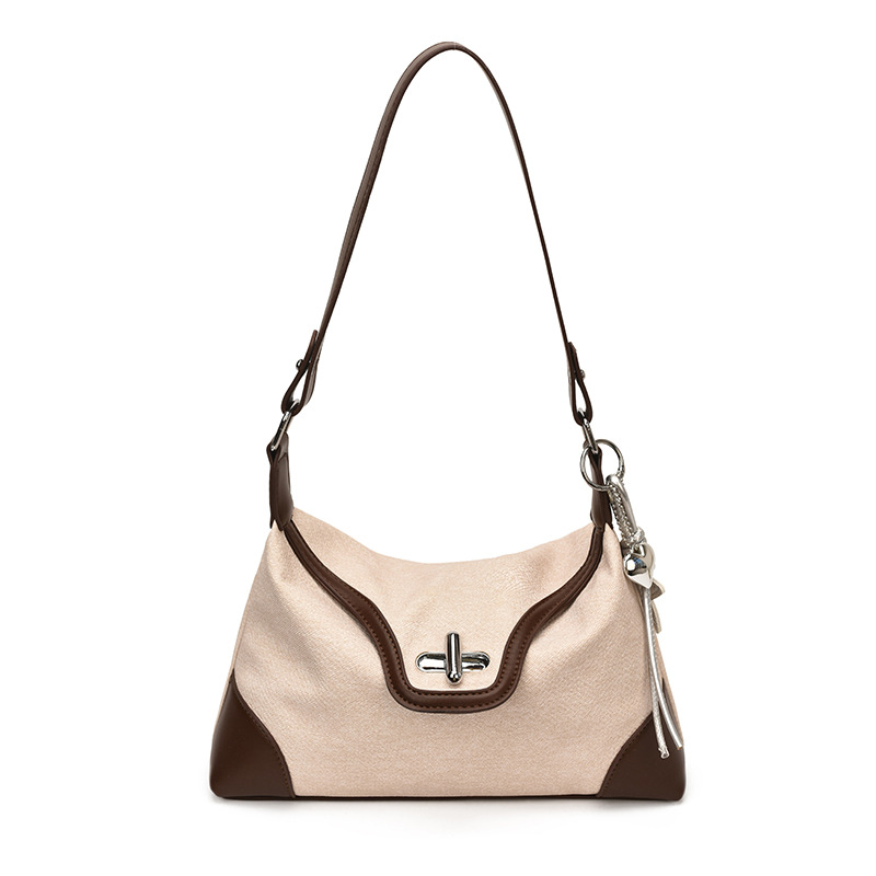 Bolso de moda de color contraste para mujeres 2026 nuevo estilo de viaje diario sensación de bolso de brazo de hombro universal para salir bolso pequeño