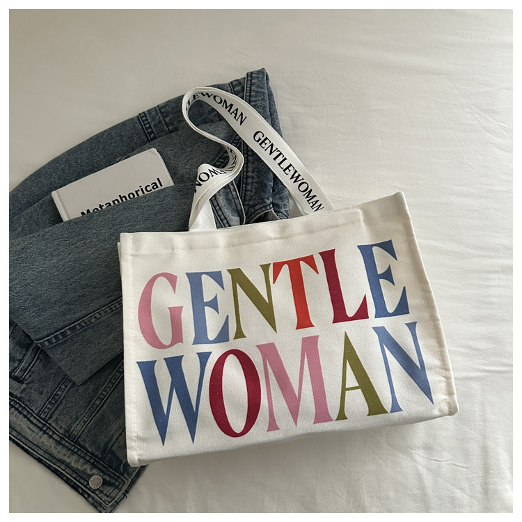 Large-capacity letter canvas bag 2025 new style ins printed versatile shoulder bag for commuting and portable ladies' tote bag undefined
