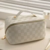 White pillow, cosmetic bag