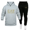 Light gray + black pants + gold label
