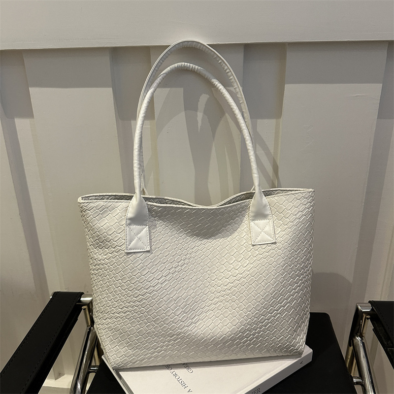 El nuevo bolso de moda de este año con textura tejida, bolso de hombro para mujer, bolso de estilo minimal de moda